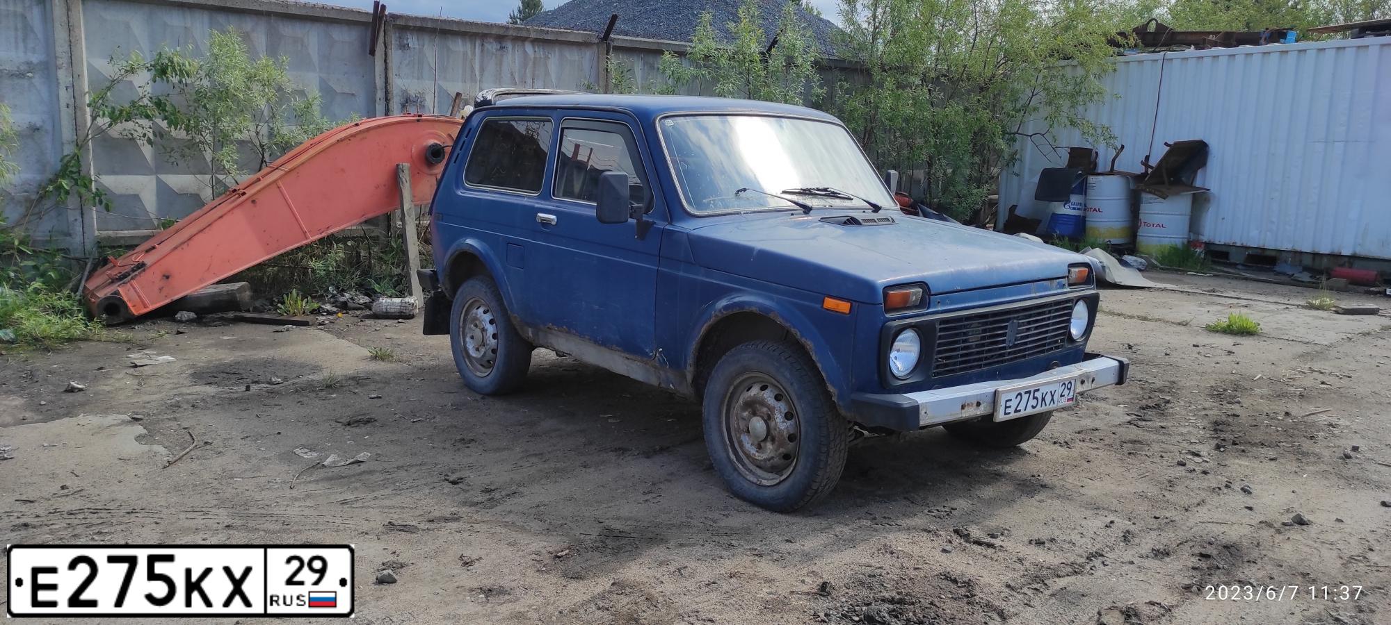 Фото автомобиля LADA 2121 NIVA, 2002 — госномер О129ОВ29. Цвет: сине-зеленый