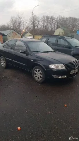 Фото автомобиля NISSAN ALMERA, 2006 — госномер Е645ВА750. Цвет: ЧЕРНЫЙ