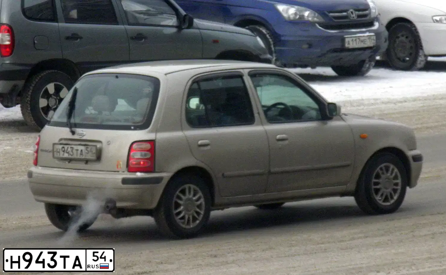 Фото автомобиля NISSAN MARCH, 2001 — госномер Н943ТА54
