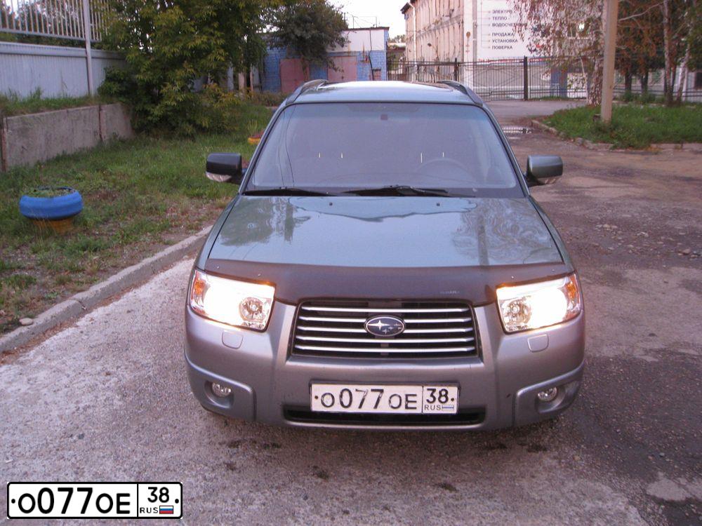 Фото автомобиля SUBARU FORESTER, 2006 — госномер О077ОЕ38. Цвет: ЗЕЛЕНЫЙ