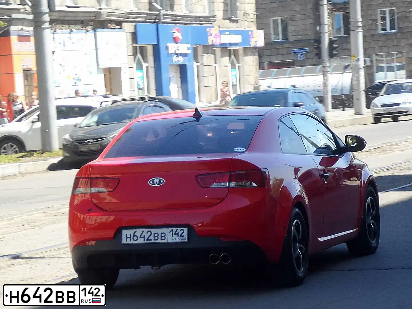 Фото автомобиля KIA CERATO, 2010 — госномер Н642ВВ142. Цвет: КРАСНЫЙ