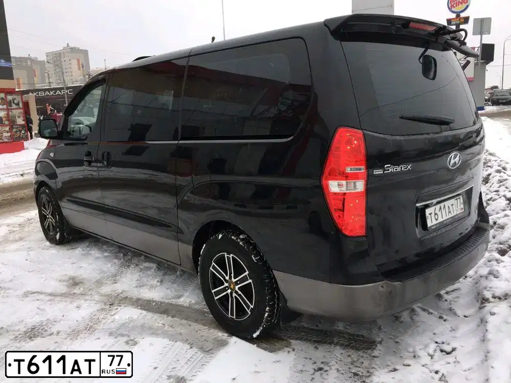 Фото автомобиля HYUNDAI GRAND STAREX, 2011 — госномер О892АО797. Цвет: ЧЕРНЫЙ