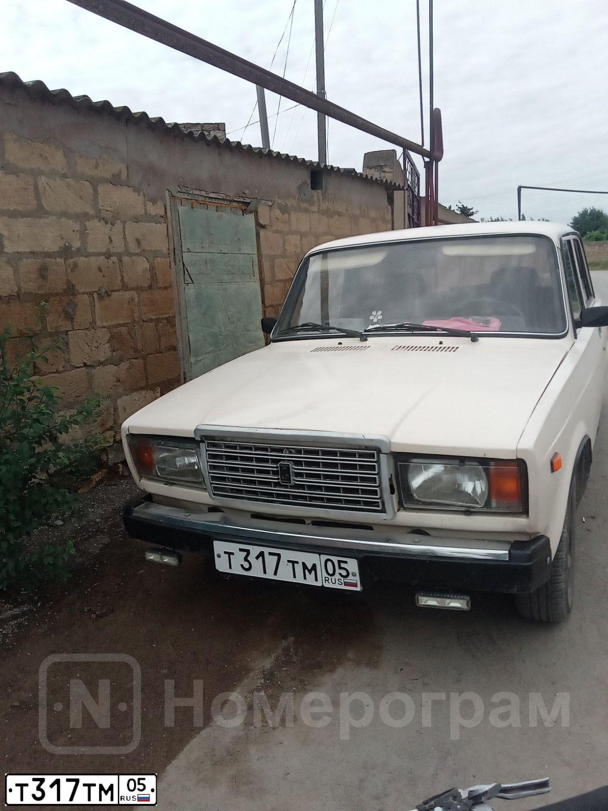 Фото автомобиля LADA 2107, 2001 — госномер Т317ТМ05. Цвет: СЛИВОЧНО-БЕЛЫЙ