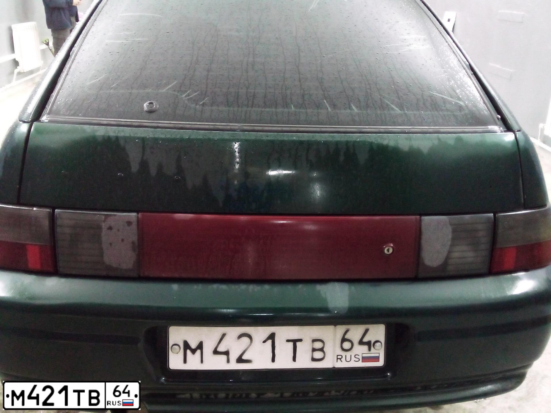 Фото автомобиля LADA 2112, 2002 — госномер М421ТВ64. Цвет: ТЕМНО ЗЕЛЕНЫЙ