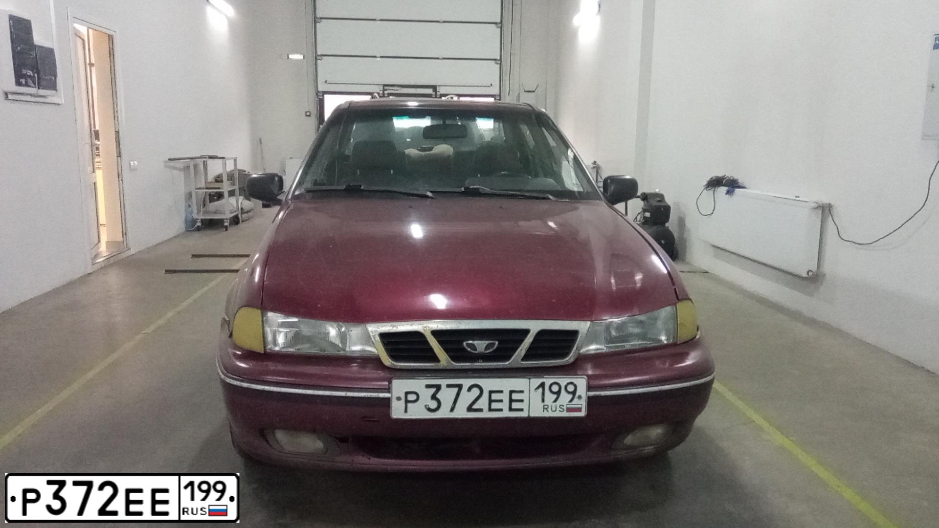 Фото автомобиля DAEWOO NEXIA, 2004 — госномер Р372ЕЕ199. Цвет: КРАСНЫЙ