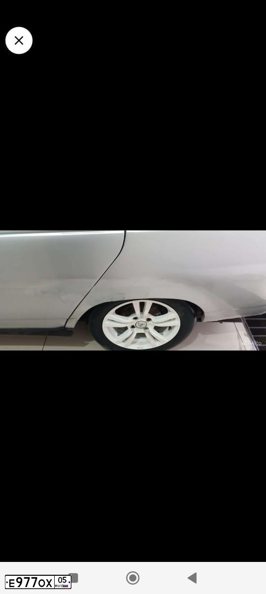 Фото автомобиля LADA 2110, 2002 — госномер Х461АО05. Цвет: СНЕЖНАЯ КОРОЛЕВА