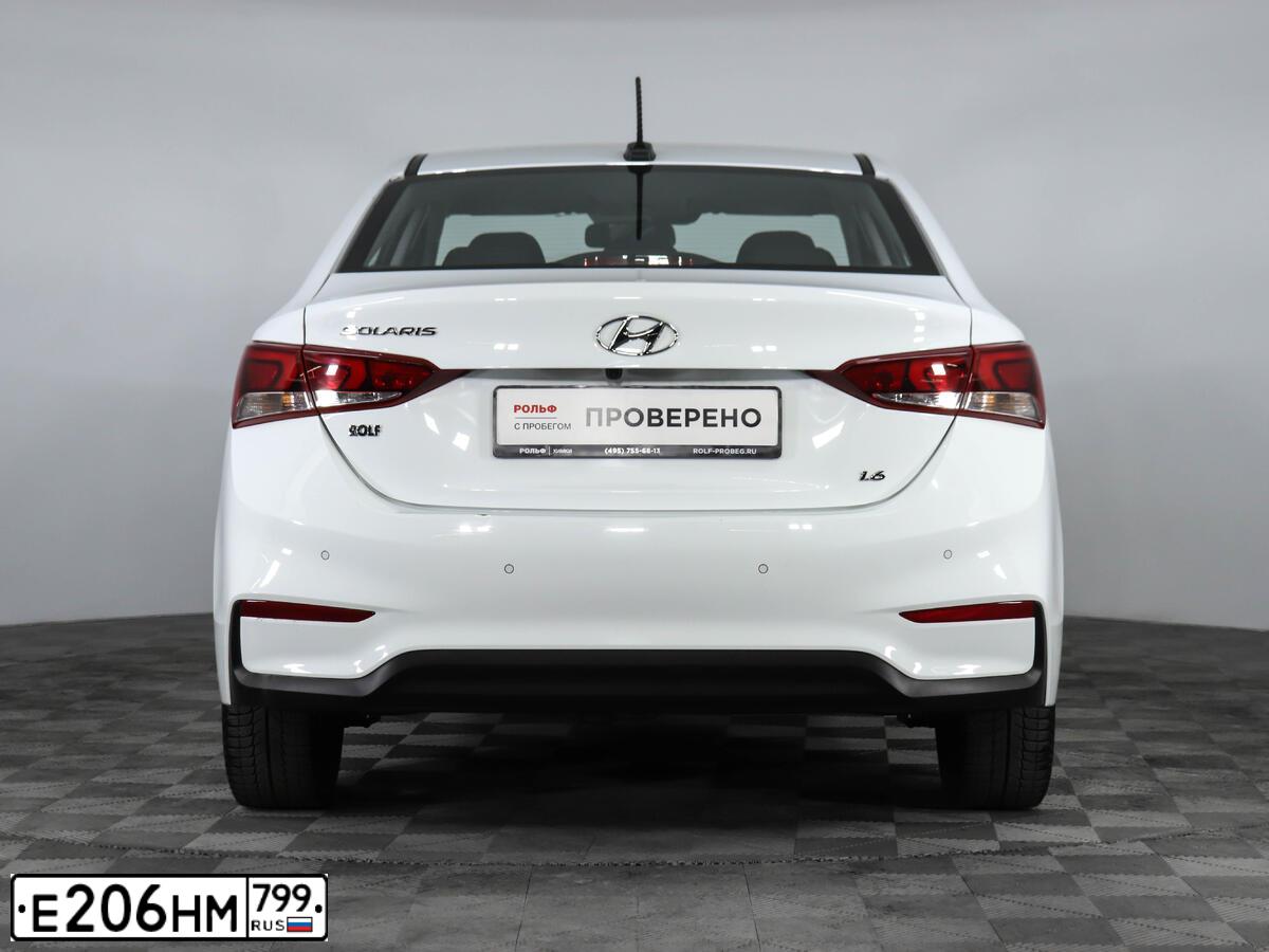 Фото автомобиля HYUNDAI SOLARIS, 2019 — госномер М910КН21. Цвет: Белый