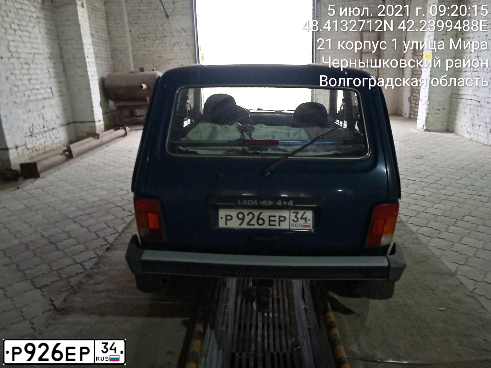 Фото автомобиля LADA 2121 NIVA, 2011 — госномер Р926ЕР34. Цвет: ТЕМНО ЗЕЛЕНЫЙ