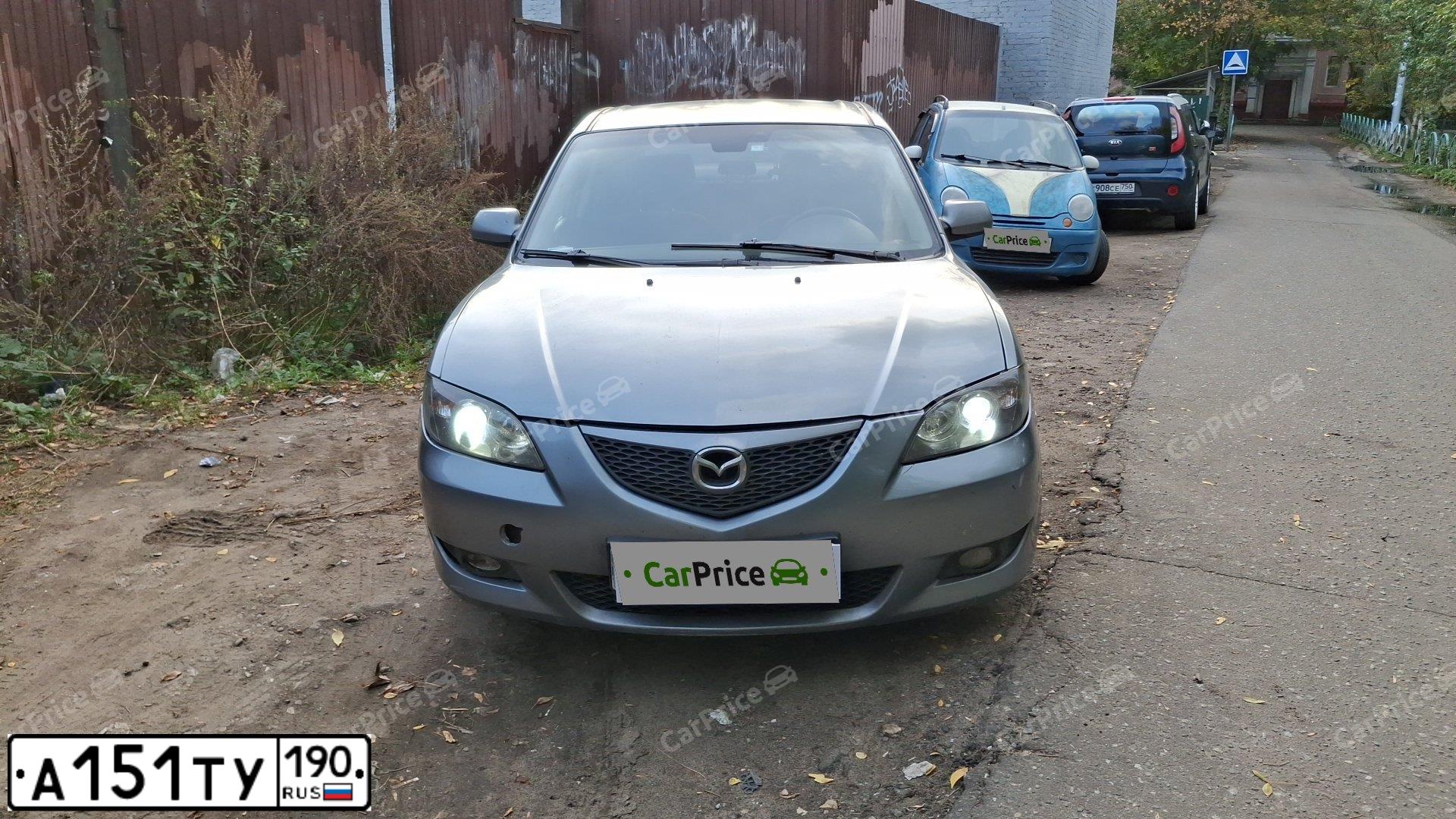 Фото автомобиля MAZDA 3, 2006 — госномер К038УЕ790. Цвет: СЕРЫЙ ТЕМНЫЙ