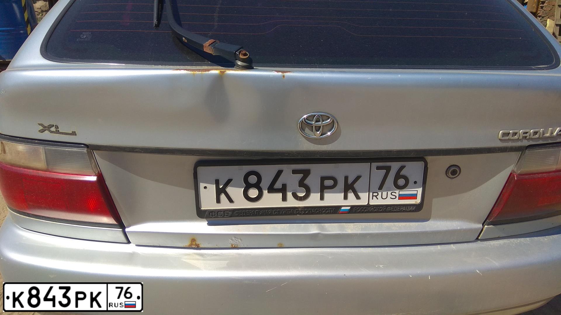 Фото автомобиля TOYOTA COROLLA, 1996 — госномер К843РК76. Цвет: СВЕТЛО-СЕРЫЙ