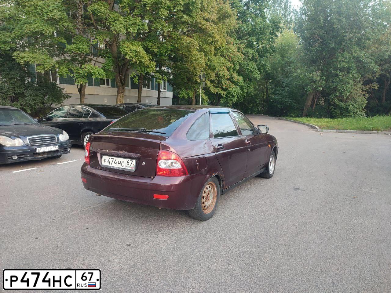 Фото автомобиля LADA 2172 PRIORA, 2011 — госномер Р474НС67. Цвет: ТЕМНО-ВИШНЕВЫЙ