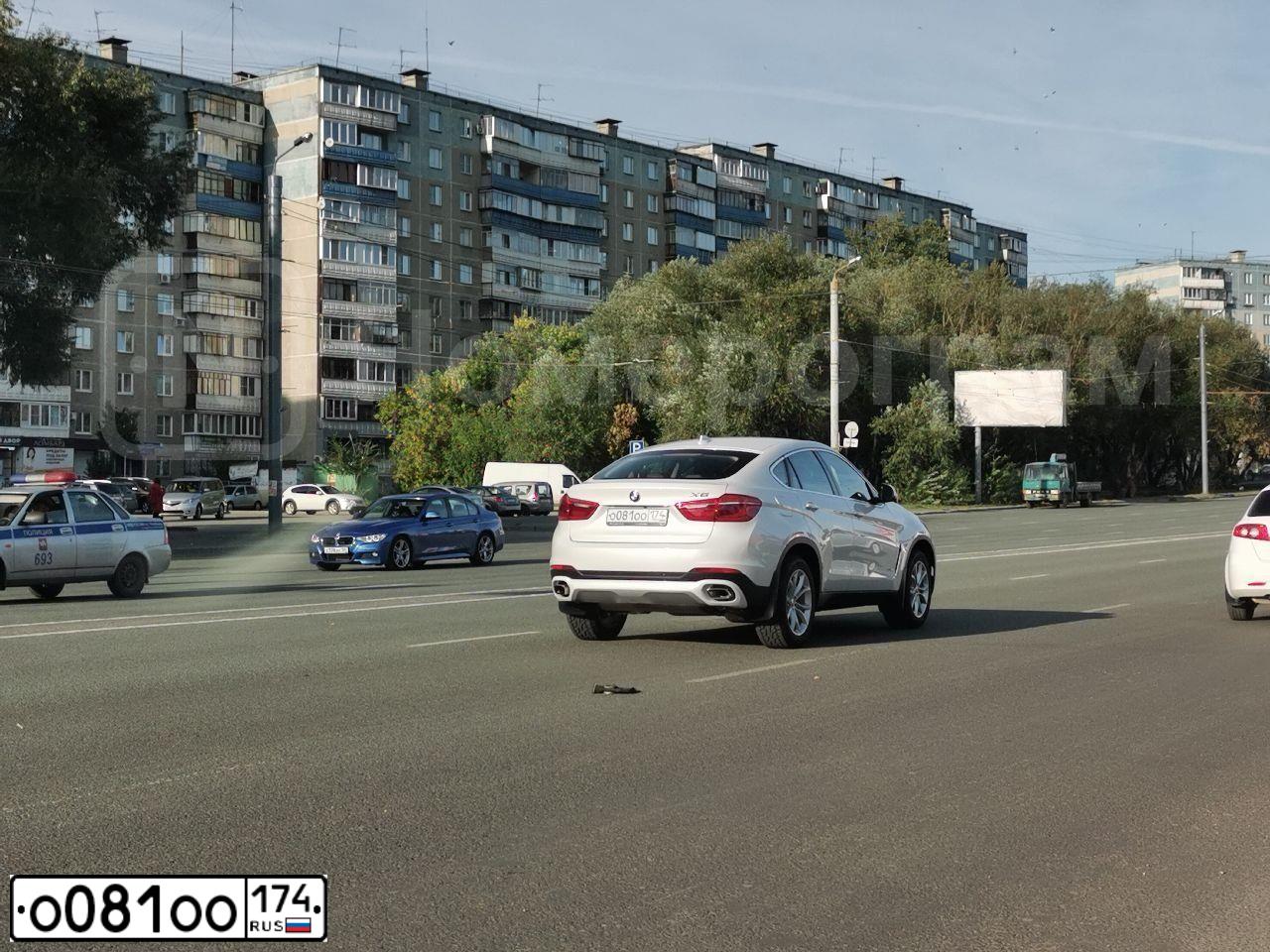 Фото автомобиля BMW X6, 2008 — госномер О081ОО174. Цвет: Серебристый