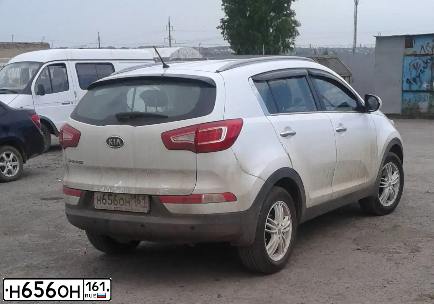 Фото автомобиля KIA SPORTAGE, 2012 — госномер Н656ОН161. Цвет: Белый