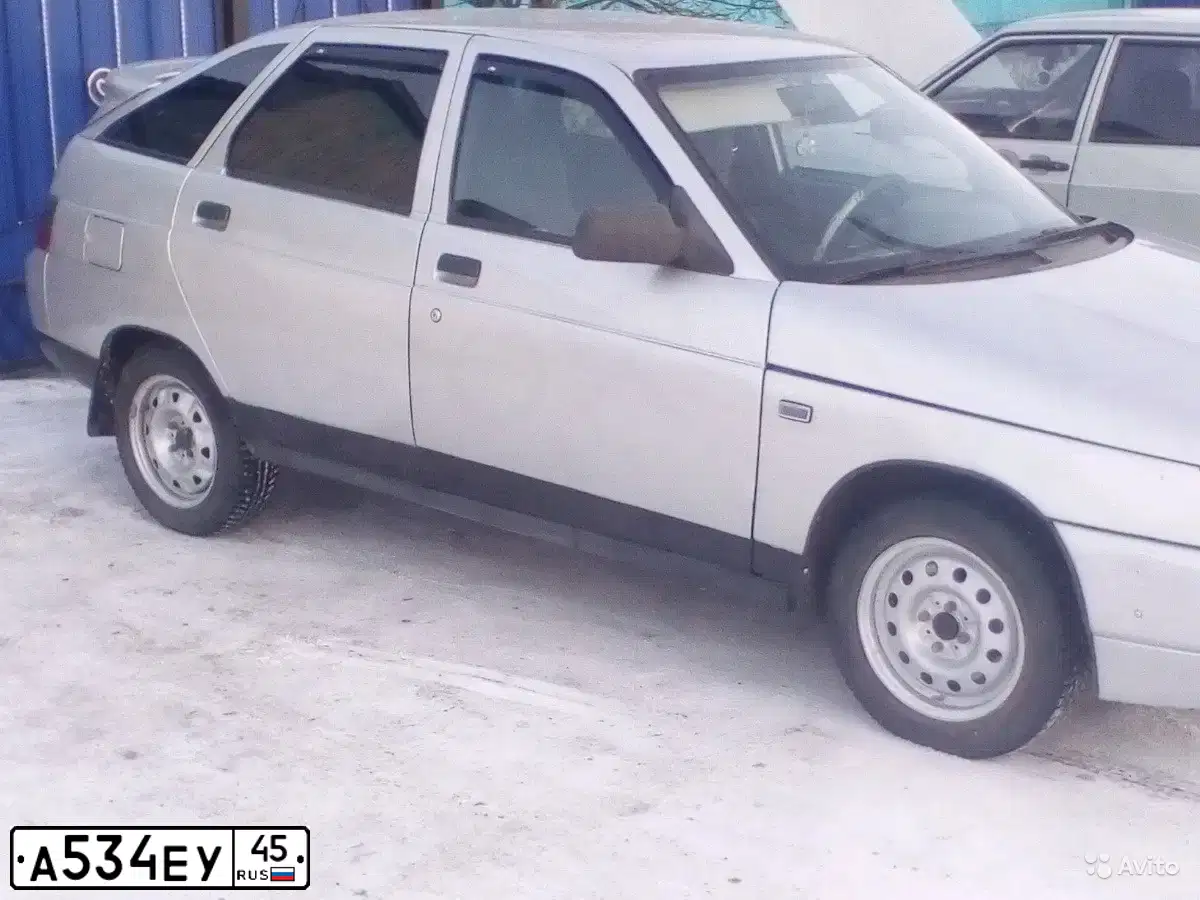 Фото автомобиля LADA 2112, 2003 — госномер Т570НЕ45. Цвет: СВЕТЛО-СЕРЕБ МЕТАЛЛ