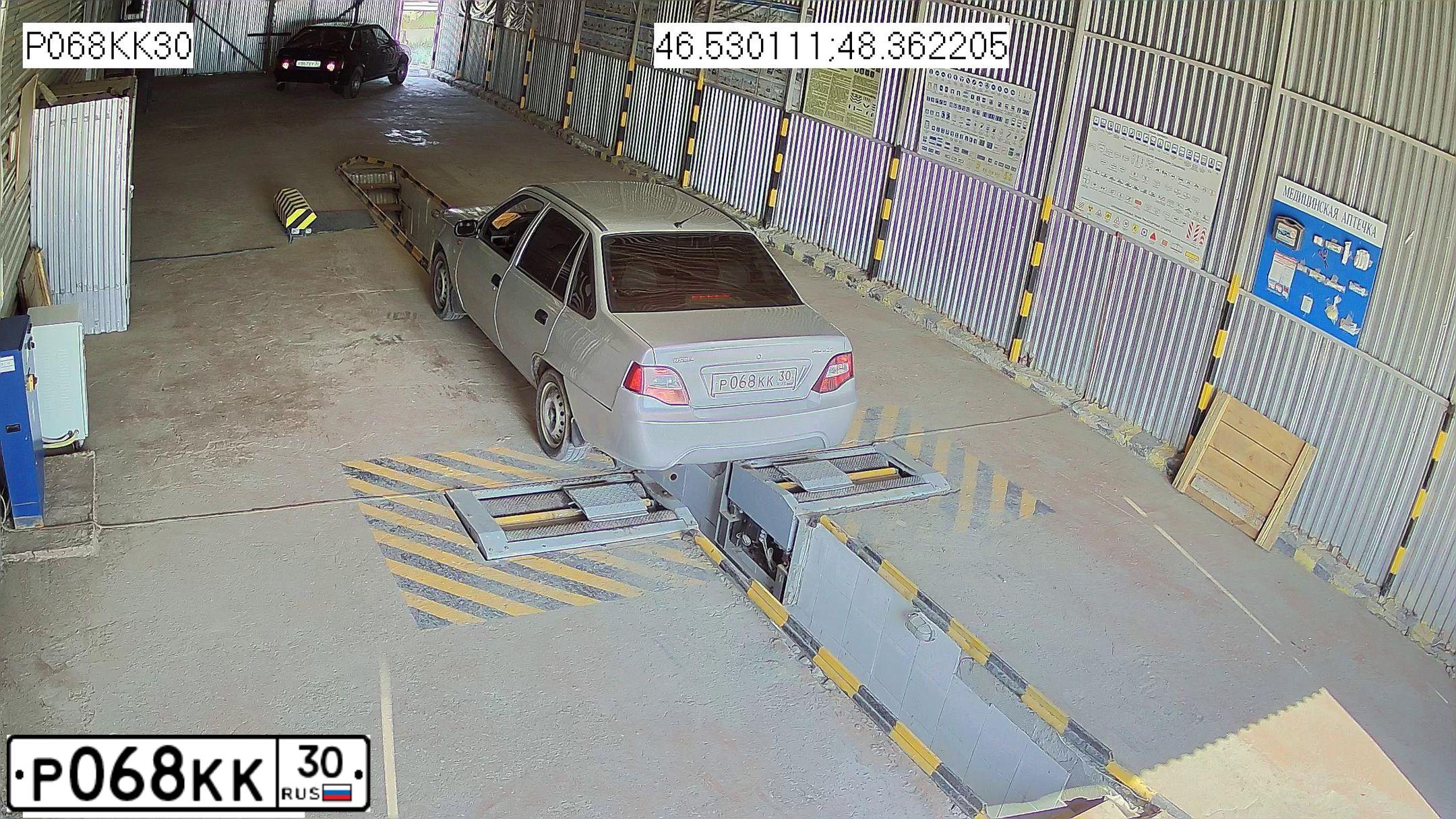 Фото автомобиля DAEWOO NEXIA, 2010 — госномер Р068КК30. Цвет: СЕРЕБРИСТЫЙ