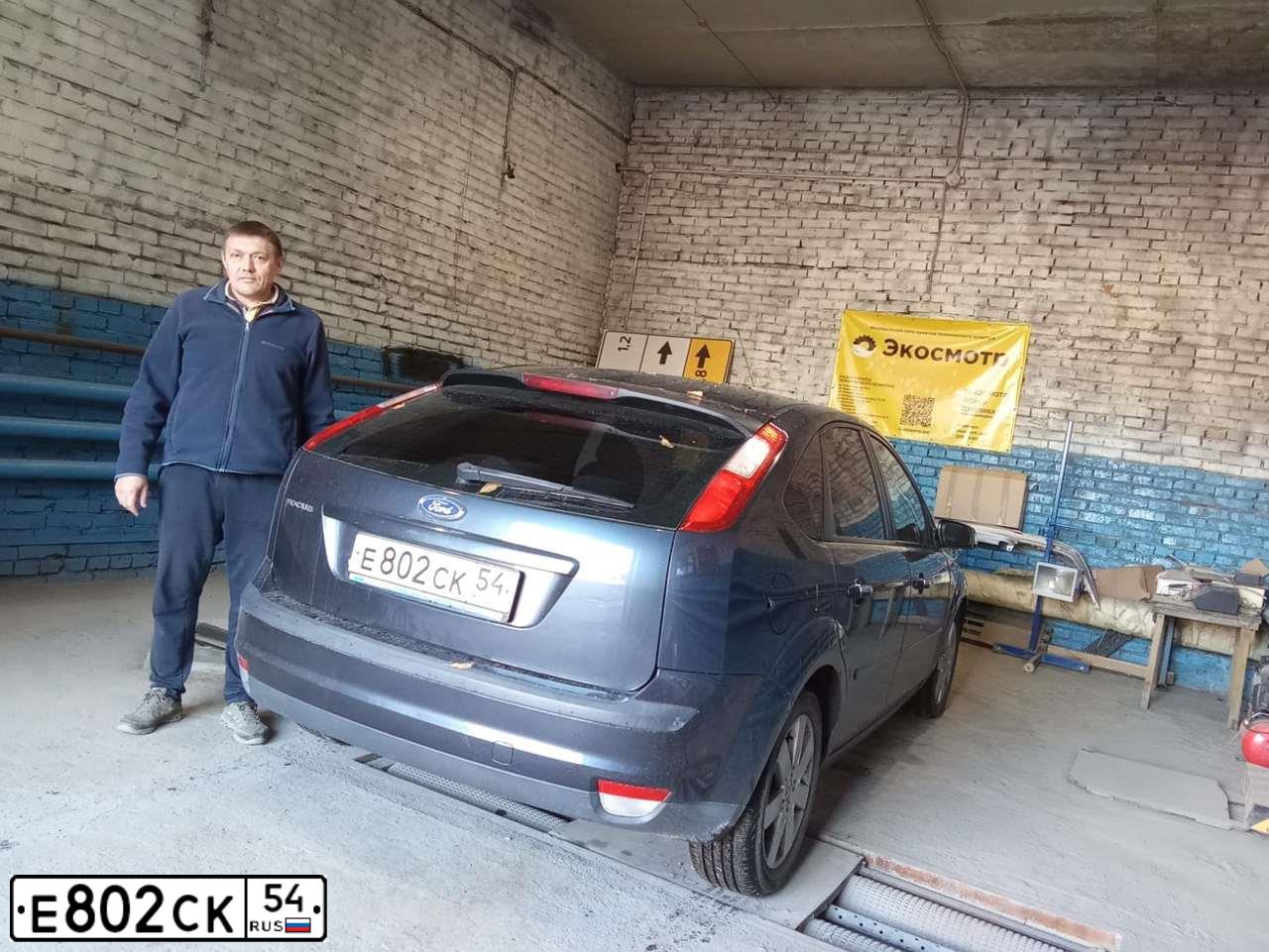 Фото автомобиля FORD FOCUS, 2006 — госномер Р291СХ154. Цвет: ТЕМНО СЕРЫЙ