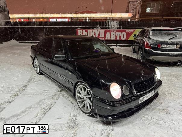 Фото автомобиля MERCEDES E-KLASSE, 1998 — госномер Х400УТ72. Цвет: ЧЕРНЫЙ