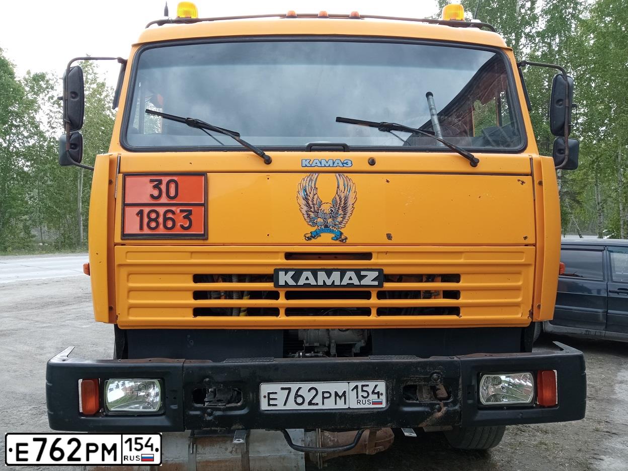 Фото автомобиля KAMAZ 65116 /6X4/, 2011 — госномер Е762РМ154. Цвет: ЖЕЛТЫЙ ГЕОРГИН