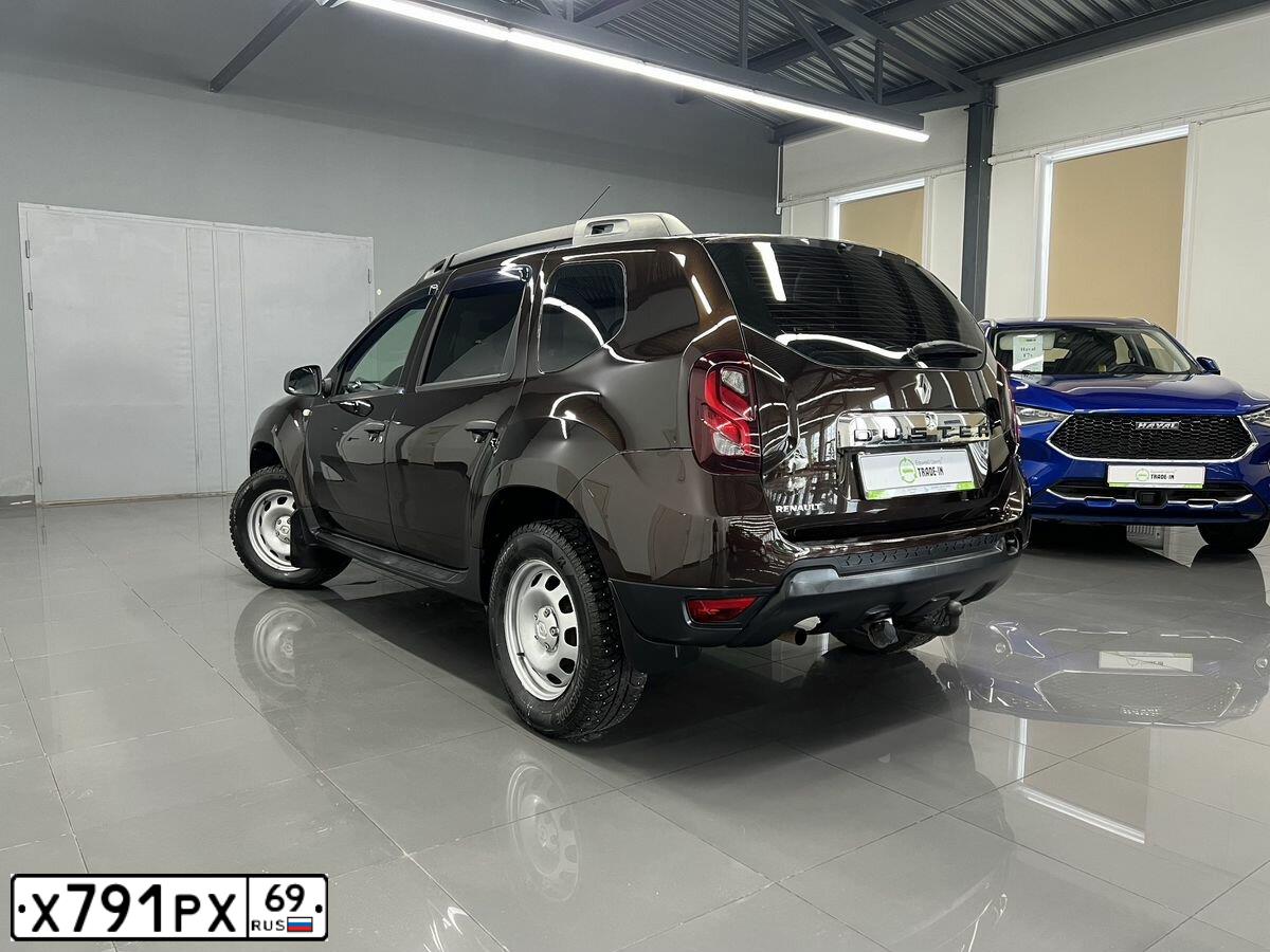 Фото автомобиля RENAULT DUSTER, 2015 — госномер Х791РХ69. Цвет: ТЕМНО-КОРИЧНЕВЫЙ