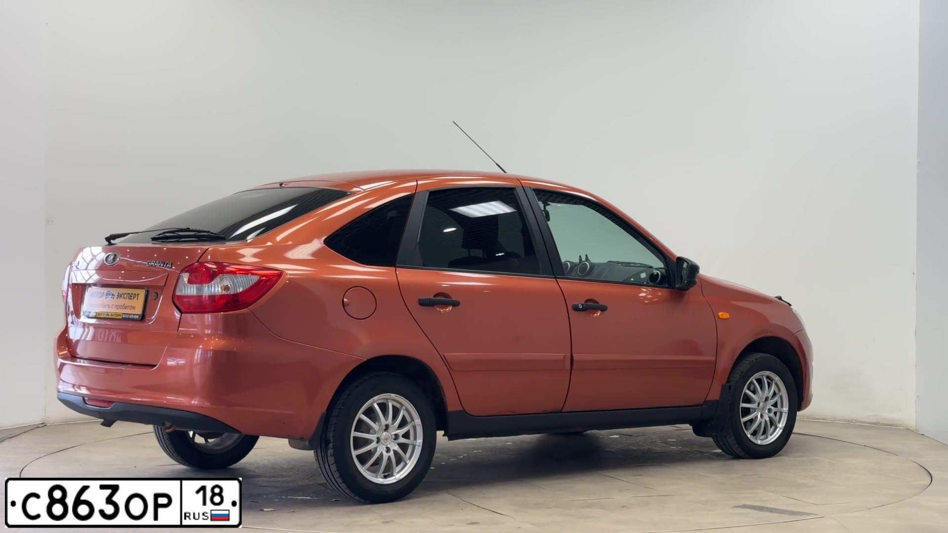 Фото автомобиля LADA 2191 GRANTA, 2014 — госномер С863ОР18. Цвет: ОРАНЖЕВЫЙ