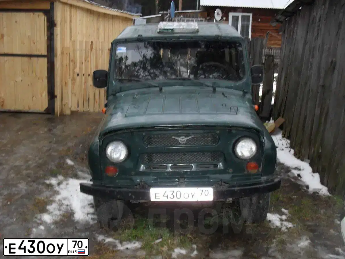 Фото автомобиля UAZ 3151 / HUNTER, 1998 — госномер Е430ОУ70. Цвет: ЗЕЛЕНЫЙ