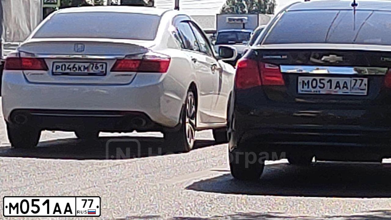 Фото автомобиля CHEVROLET CRUZE, 2012 — госномер М051АА77. Цвет: ЧЕРНЫЙ МЕТАЛЛИК