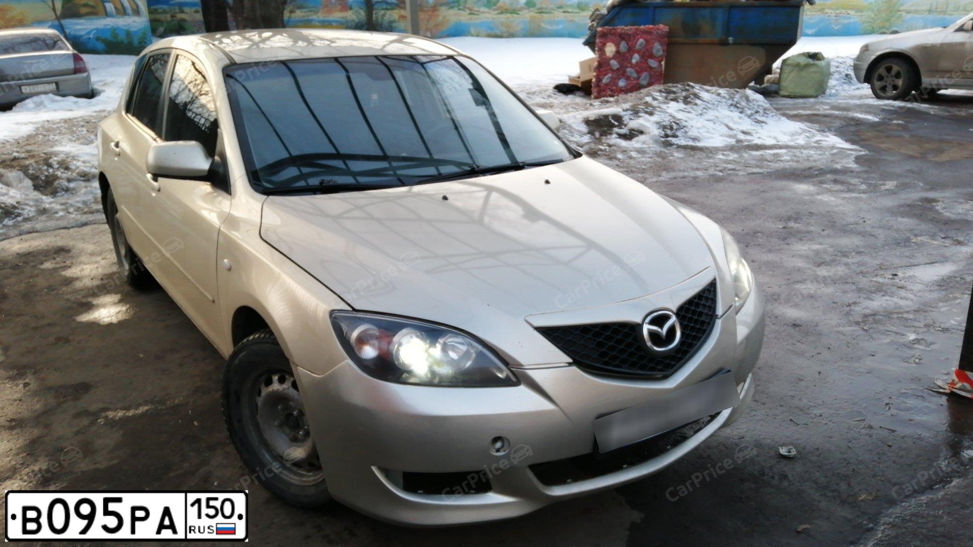Фото автомобиля MAZDA 3, 2006 — госномер О775АТ799. Цвет: ЗОЛОТИСТЫЙ