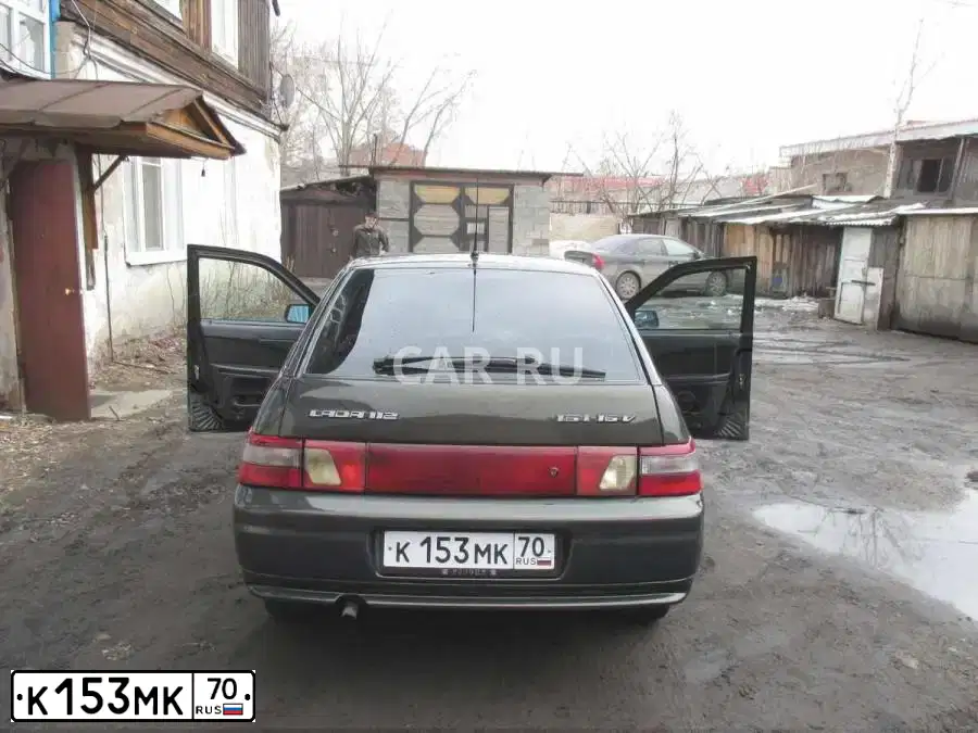 Фото автомобиля LADA 2112, 2006 — госномер Х091НТ142. Цвет: Темно-зеленый