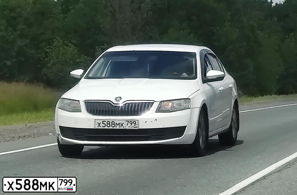 Фото автомобиля SKODA OCTAVIA, 2015 — госномер Н424РВ82. Цвет: Белый