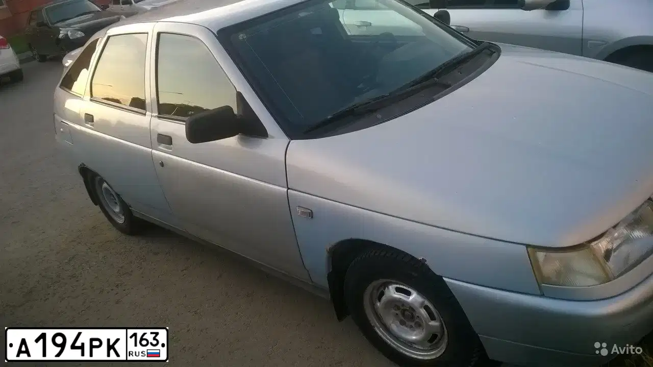 Фото автомобиля LADA 2112 LADA, 2004 — госномер М493УЕ123. Цвет: Серебристо-Желтый