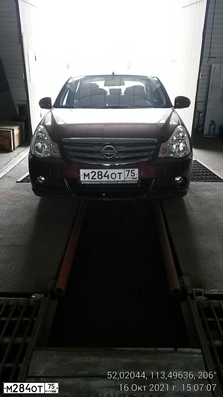 Фото автомобиля NISSAN ALMERA /AVTOVAZ/, 2017 — госномер М284ОТ75. Цвет: Красный