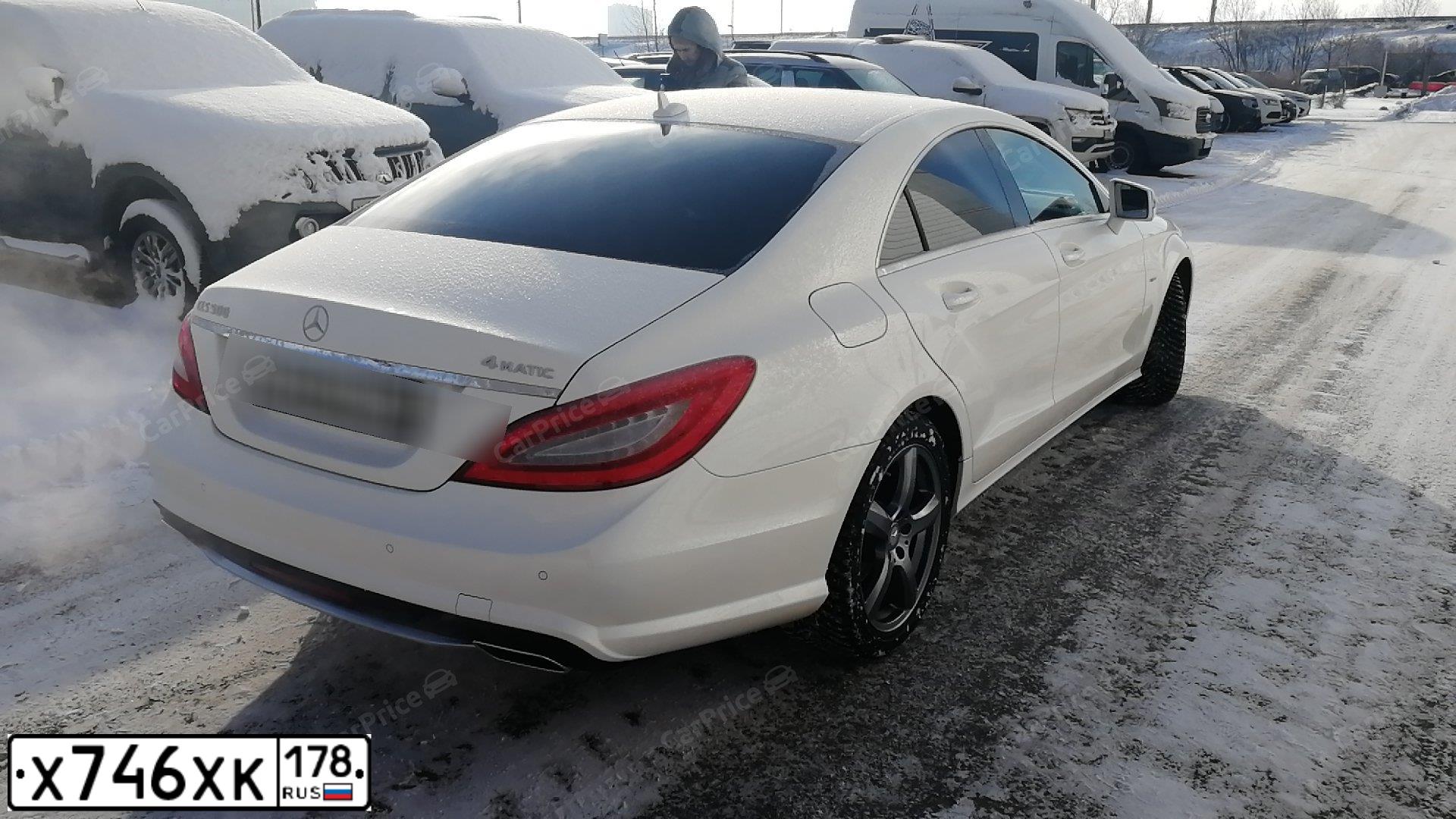 Фото автомобиля МЕРСЕДЕС-БЕНЦ CLS500 4 MATIC, 2012 — госномер Х323АЕ250. Цвет: Белый