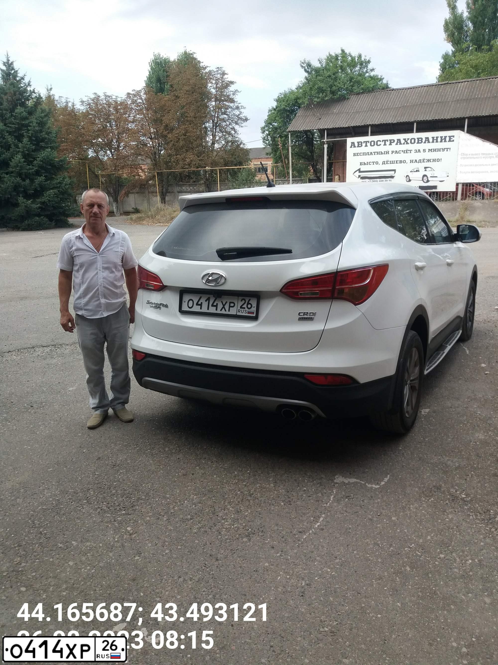 Фото автомобиля HYUNDAI SANTA FE, 2014 — госномер О414ХР26. Цвет: Белый
