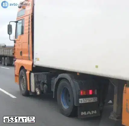 Фото автомобиля MAN TGA 18.XXX /4X2/, 2001 — госномер В531АТ57. Цвет: ОРАНЖЕВЫЙ
