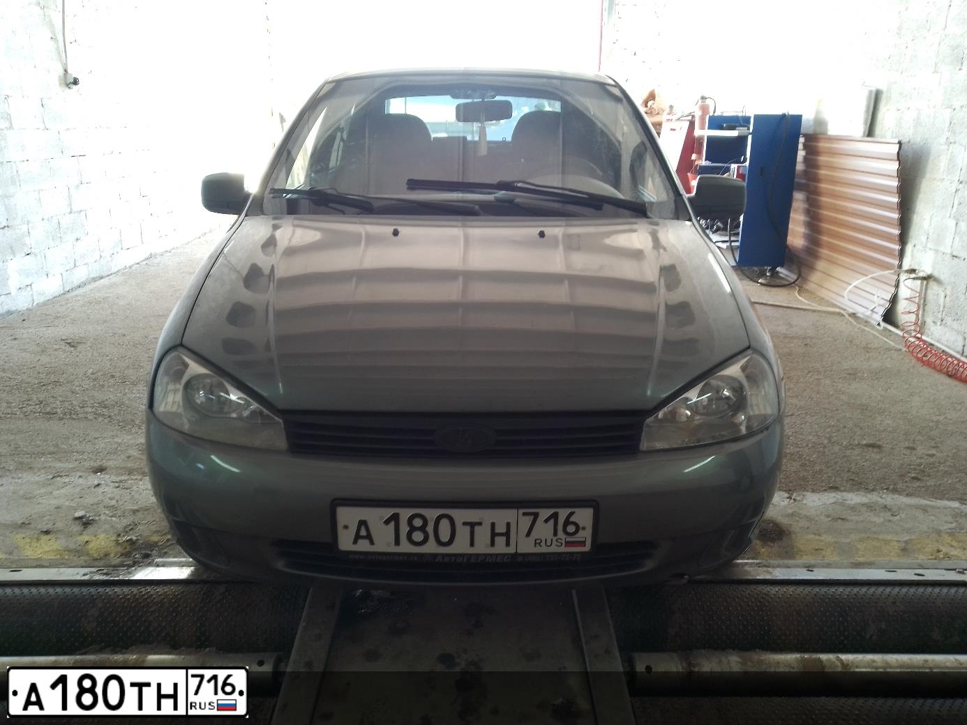 Фото автомобиля LADA 1118 KALINA, 2010 — госномер Н276ТК702. Цвет: Темно-серый металлик