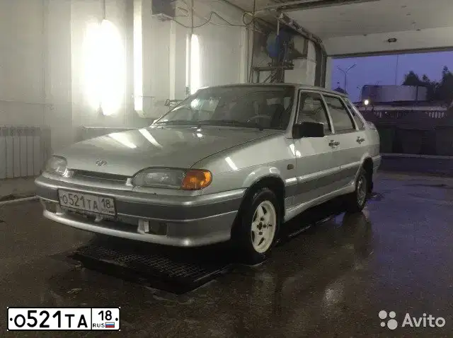 Фото автомобиля LADA 2115 SAMARA, 2005 — госномер О521ТА18. Цвет: СВЕТЛО-СЕРЕБРИСТЫЙ МЕТАЛИК