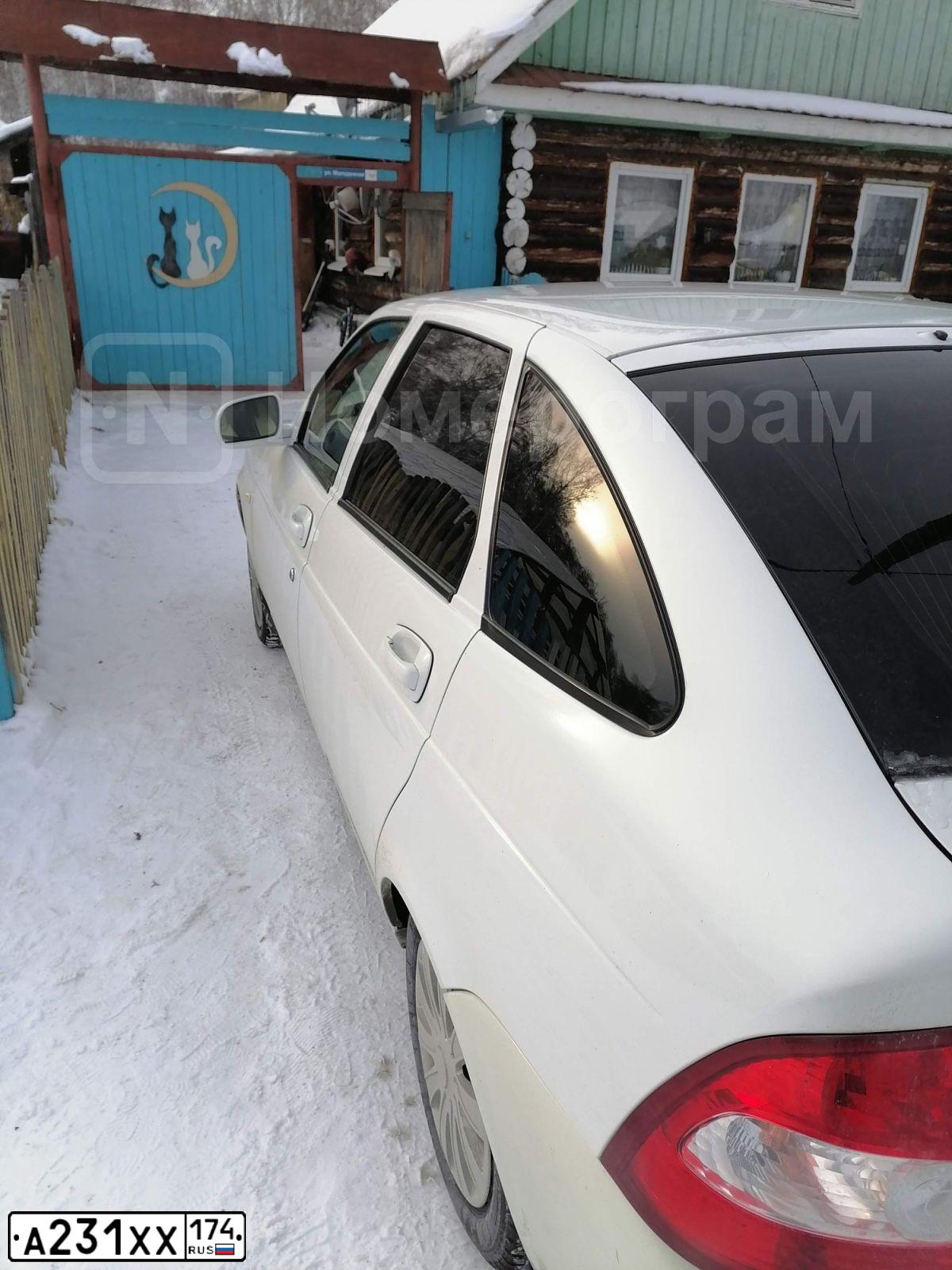 Фото автомобиля LADA 2172 PRIORA, 2011 — госномер А231ХХ174. Цвет: Белый