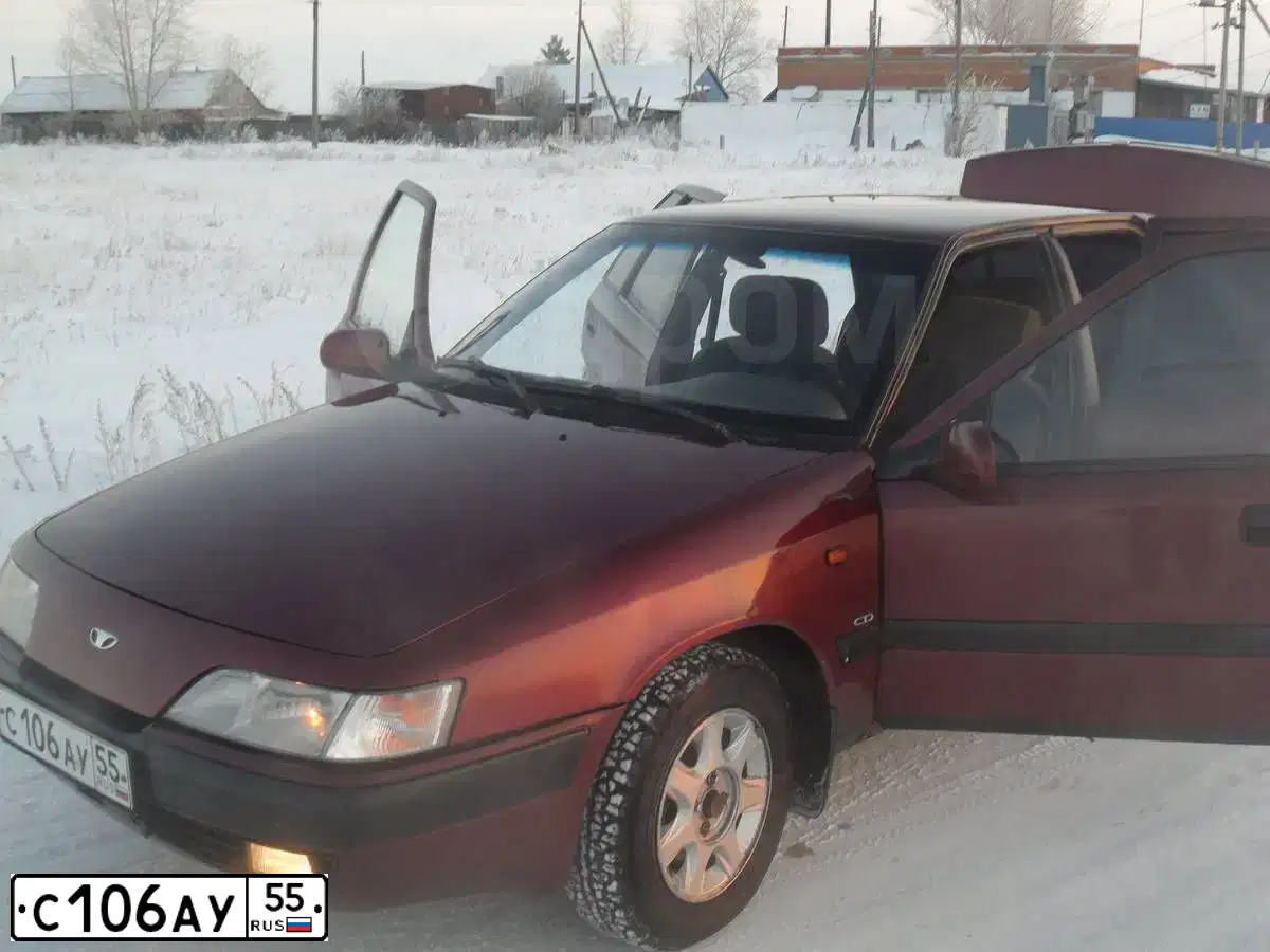 Фото автомобиля DAEWOO ESPERO, 1997 — госномер С106АУ55. Цвет: КРАСНЫЙ