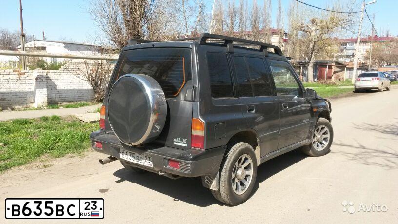 Фото автомобиля SUZUKI /GRAND/ VITARA, 1995 — госномер В635ВС23. Цвет: темно-серый