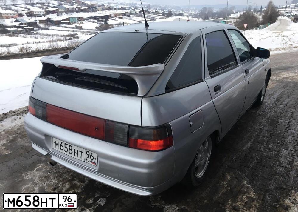 Фото автомобиля LADA 2112 LADA, 2006 — госномер Т305ВЕ196. Цвет: СВЕТЛО-СЕРЫЙ