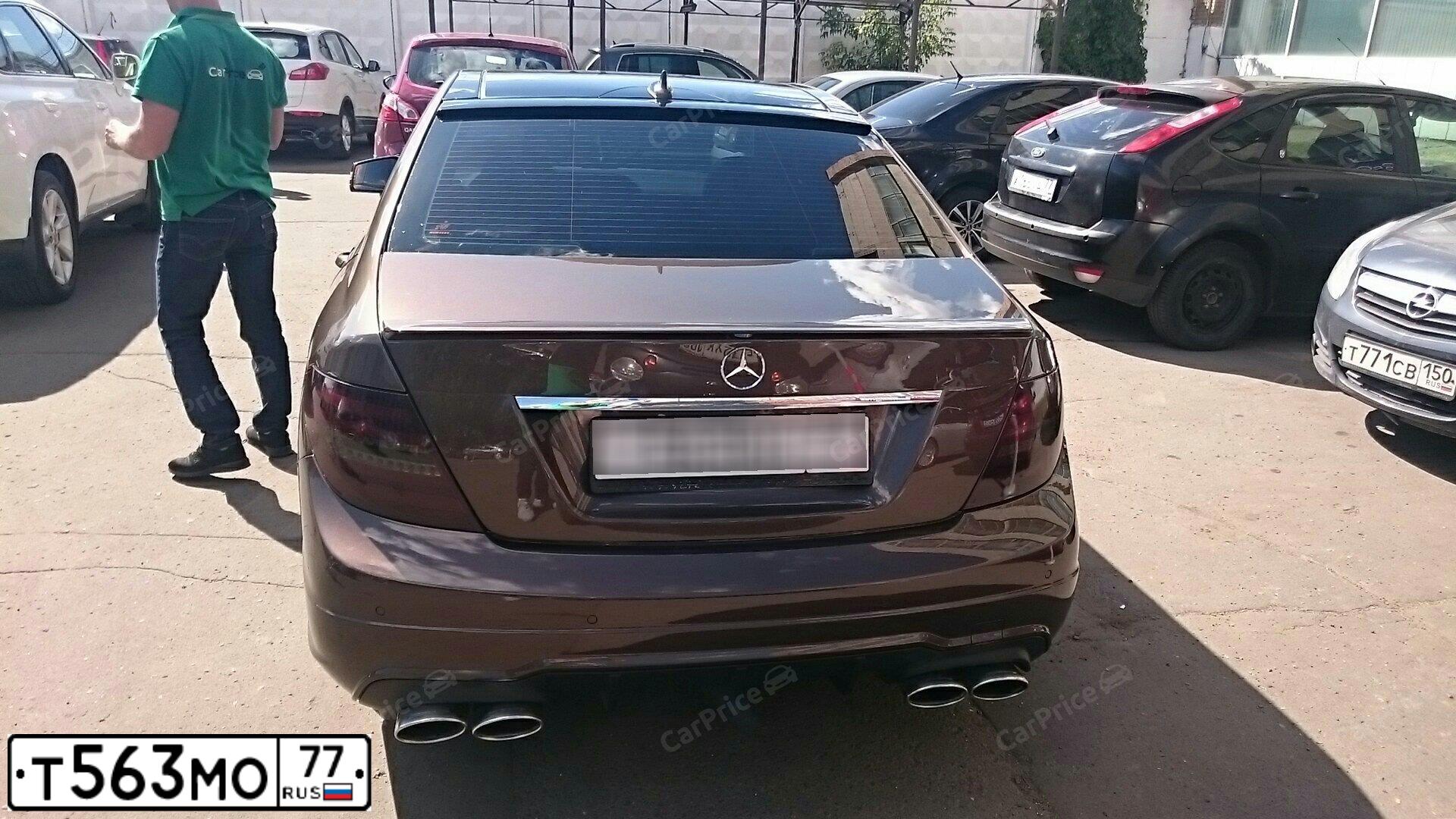 Фото автомобиля HYUNDAI GRAND STAREX, 2008 — госномер Т335ТА799. Цвет: СЕРЫЙ