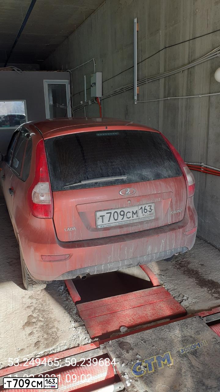 Фото автомобиля LADA 2192 KALINA, 2013 — госномер Т709СМ163. Цвет: ОРАНЖЕВЫЙ