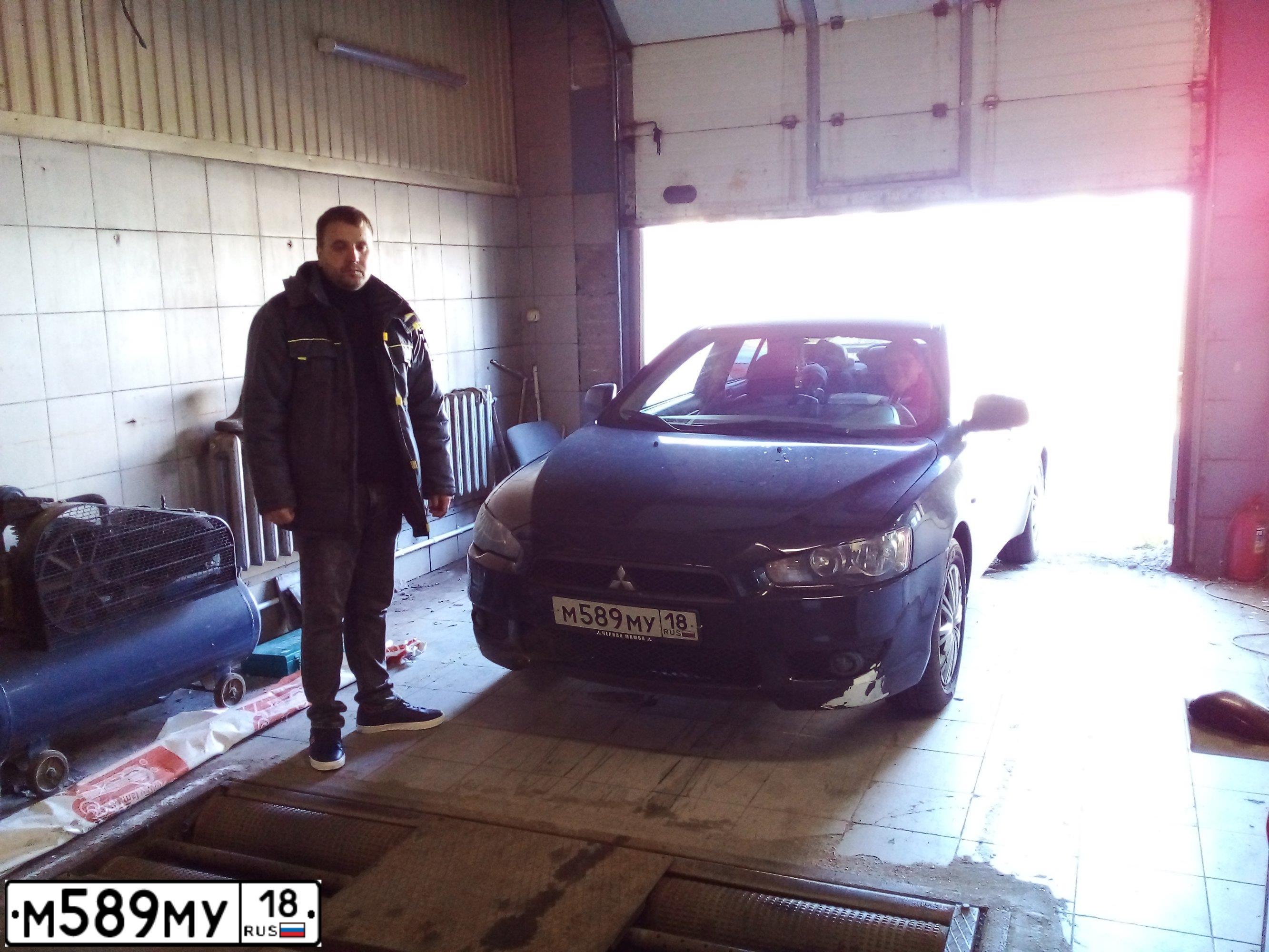 Фото автомобиля MITSUBISHI LANCER, 2010 — госномер М589МУ18. Цвет: ЧЕРНЫЙ