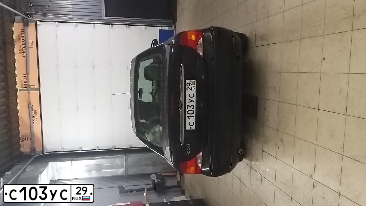 Фото автомобиля FORD FOCUS, 2005 — госномер М303КТ35. Цвет: ЧЕРНЫЙ