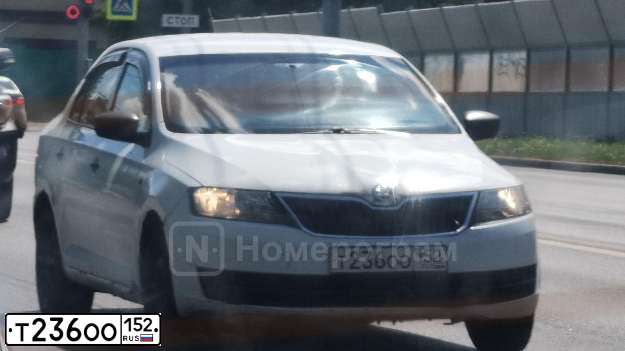 Фото автомобиля SKODA RAPID, 2015 — госномер Т236ОО152. Цвет: Белый