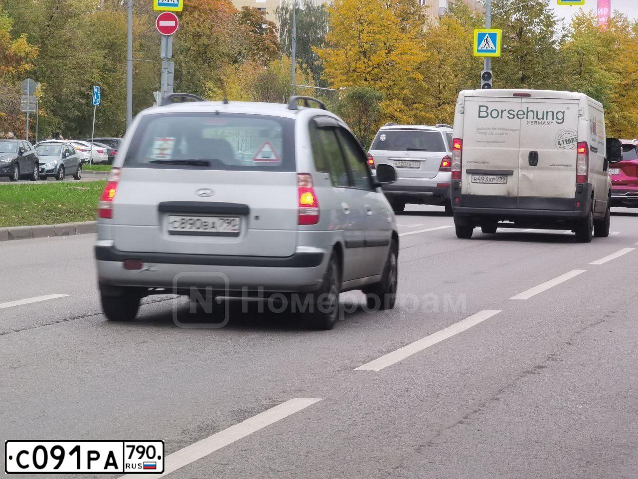 Фото автомобиля MITSUBISHI LANCER, 2008 — госномер У329ОУ31. Цвет: Красный
