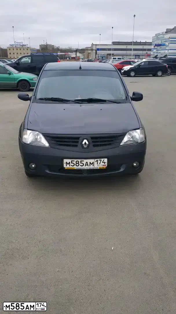 Фото автомобиля RENAULT РЕНО ЛОГАН (SR), 2007 — госномер М585АМ174. Цвет: ТЕМНО-СЕРЫЙ