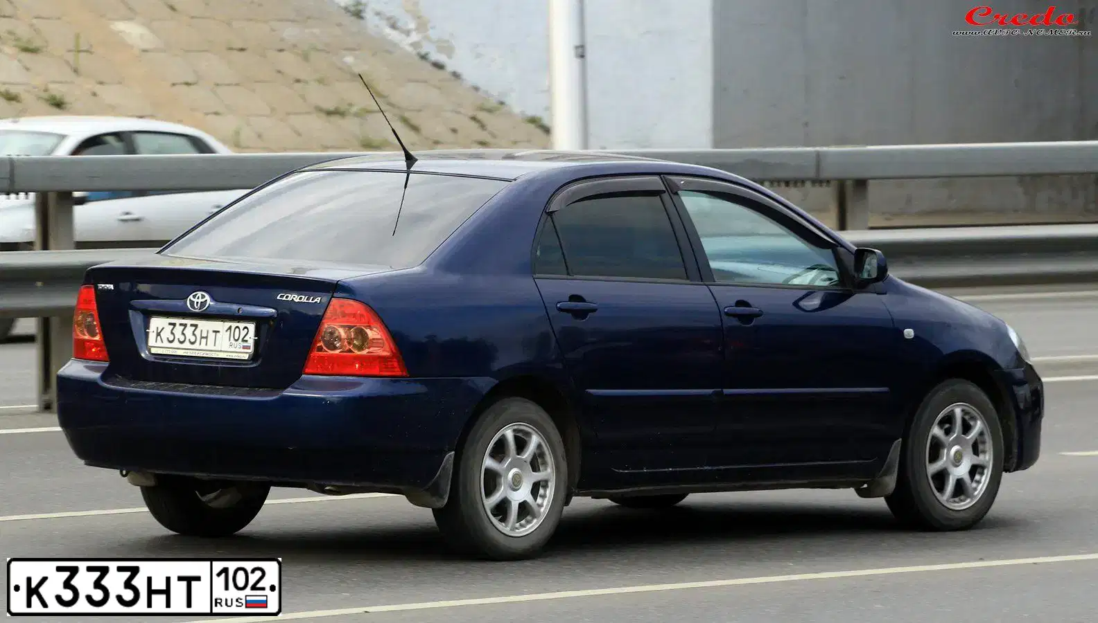 Фото автомобиля TOYOTA COROLLA, 2006 — госномер К333НТ102. Цвет: ТЕМНО-СИНИЙ