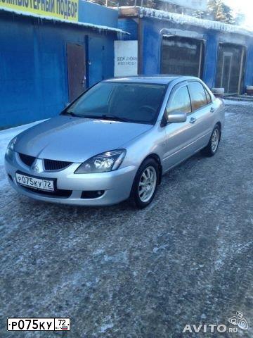 Фото автомобиля MITSUBISHI LANCER, 2004 — госномер С656МР58. Цвет: Серебристый