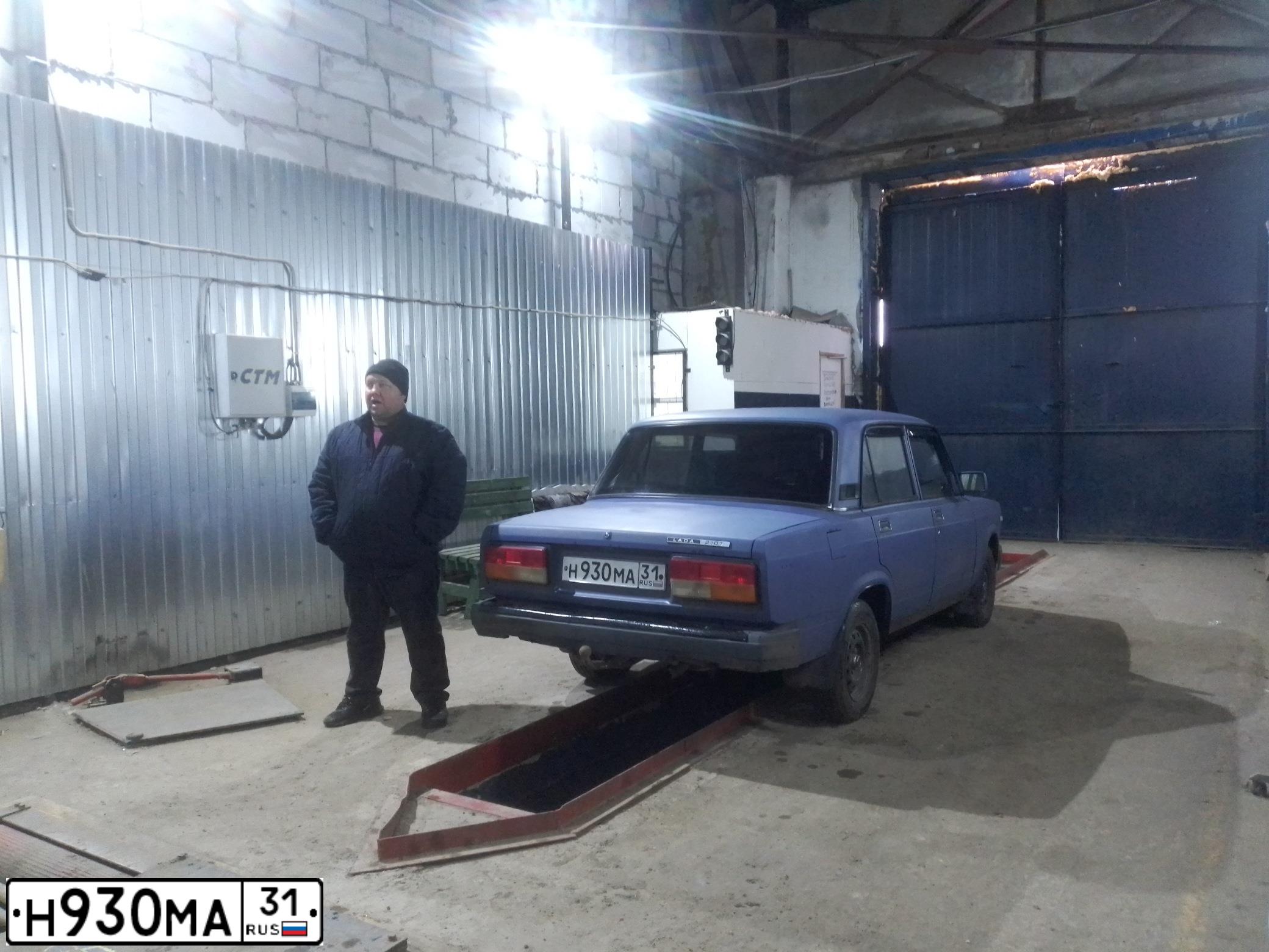 Фото автомобиля LADA 2107 LADA, 2003 — госномер Н930МА31. Цвет: СЕРО-СИНИЙ